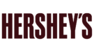 Hershey’s logo in brown displays in logo carousel featuring world-class client companies of Angela V. Fox Coaching.