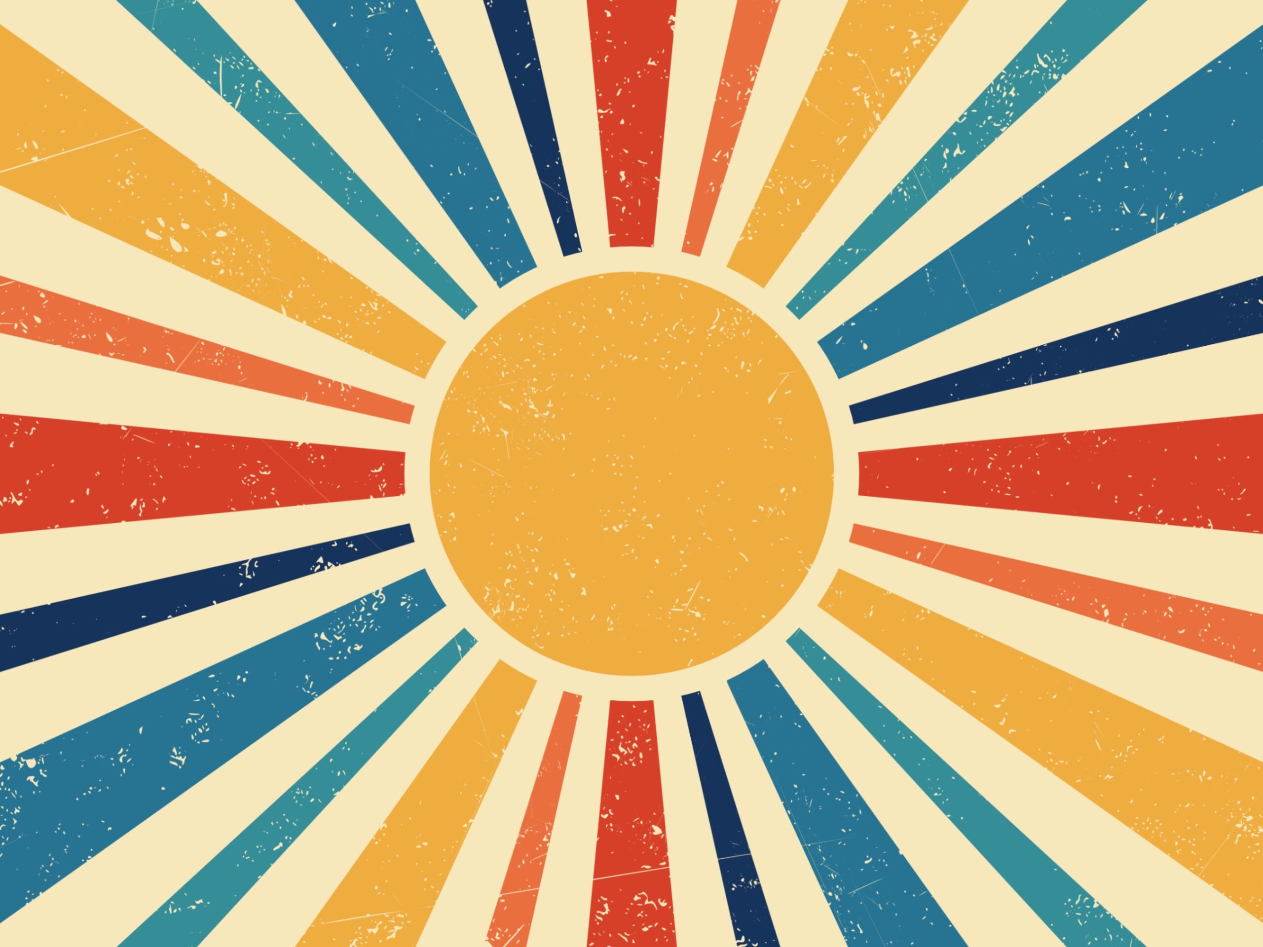 Illustration of gold sunburst on tan background with red, orange, blue, green, and gold rays represents ideas for fulfilled working, living, and playing from Angela V. Fox Coaching.